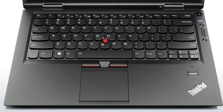 În realitate, touchpad-ul are o altă textură
